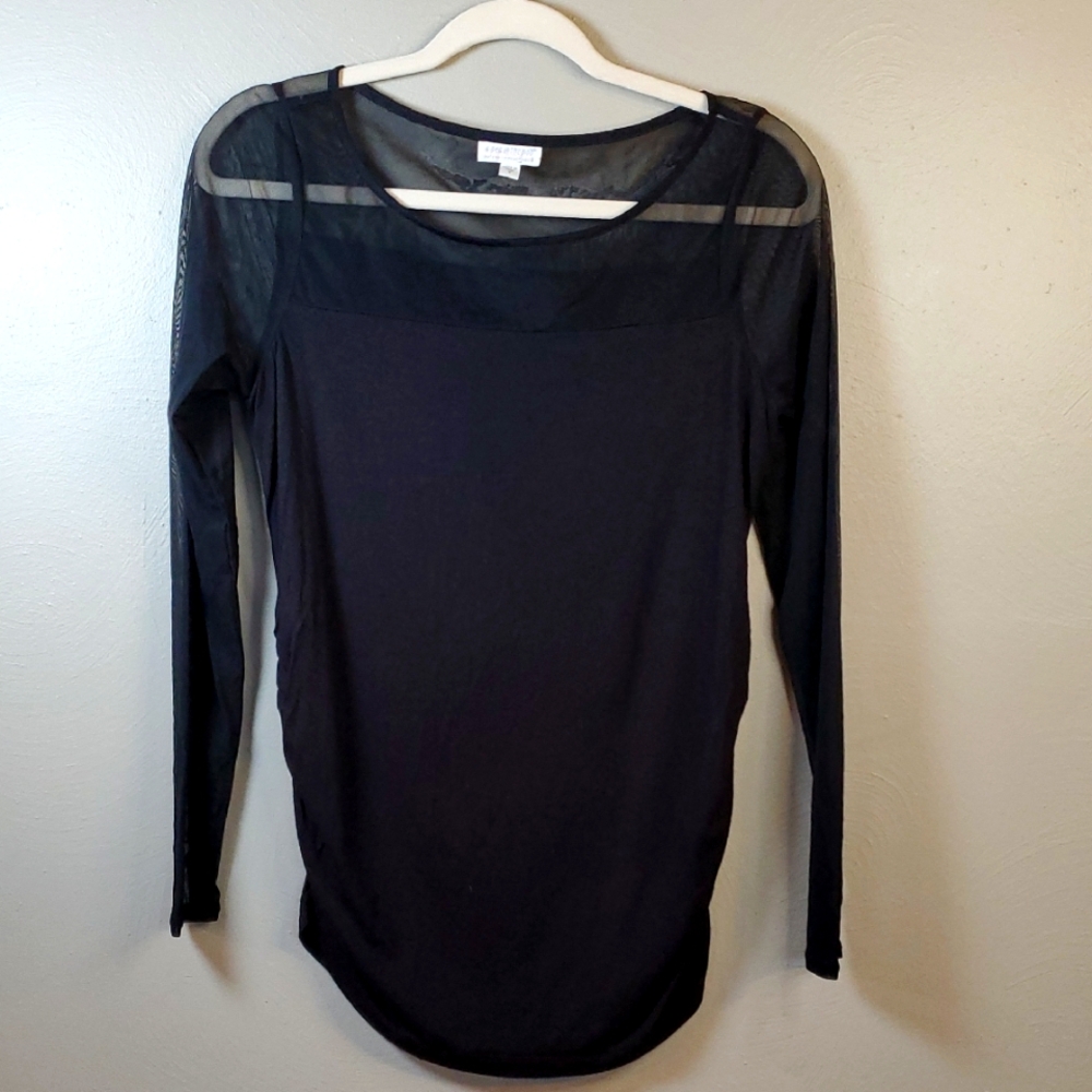 A pea in the pod black shirt with sheer, long sleeves. Rouged sides, small